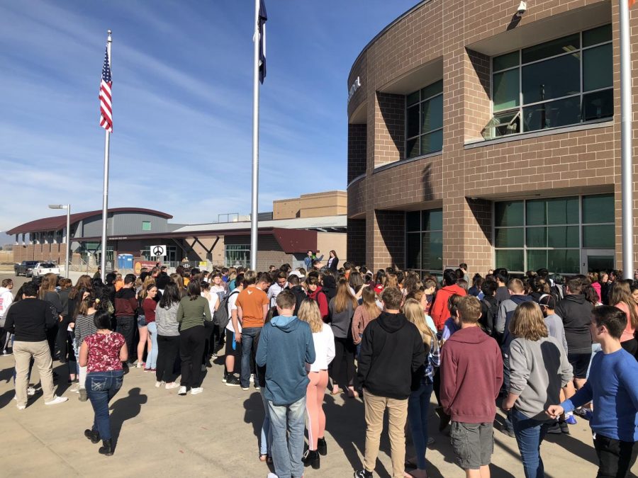 Students gathered outside Mead High School on Wednesday morning, participating in the walk out