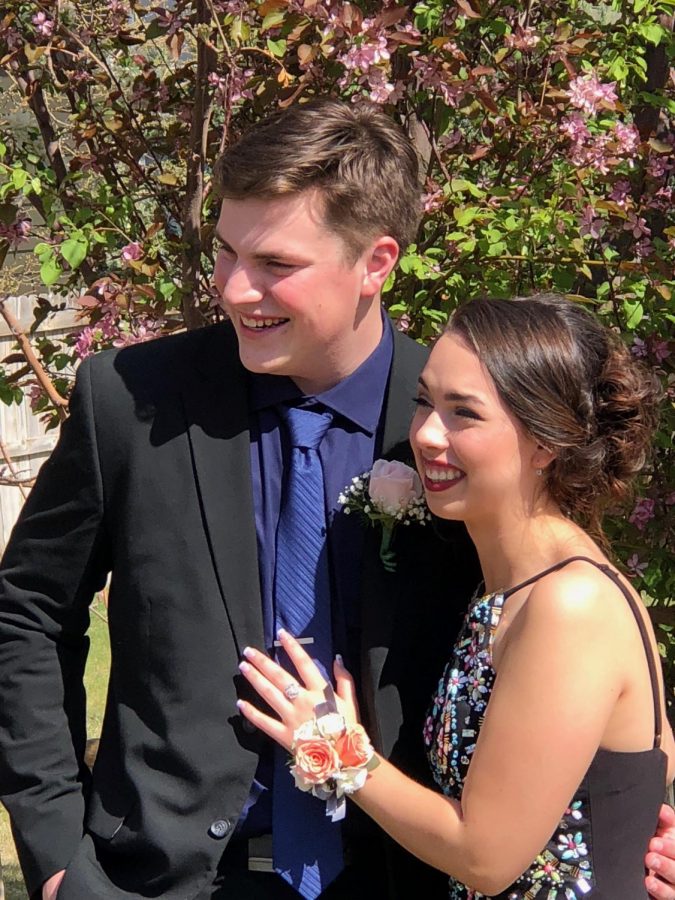 Colten Dudley and Chloee McClellan pose together for their last prom.