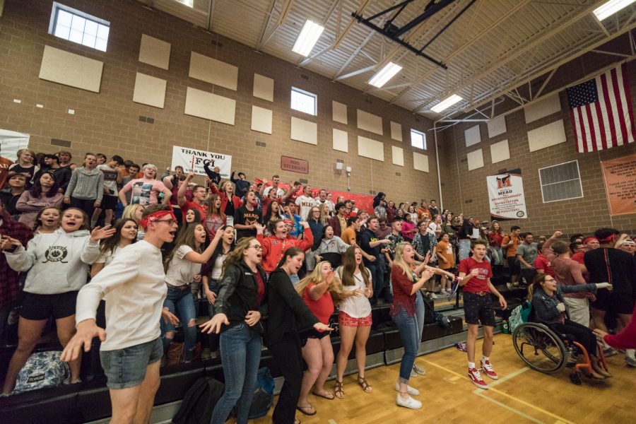 Students cheer for Unified athletes during a 2017-2018 assembly. 