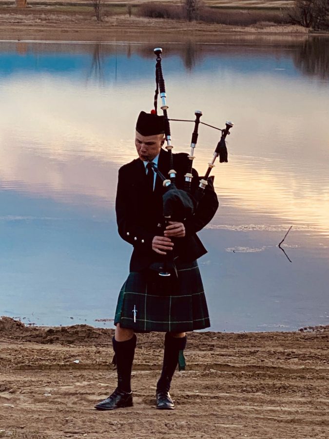 Ashton Steele plays the bagpipes in the Sunset Solidarity Movement.