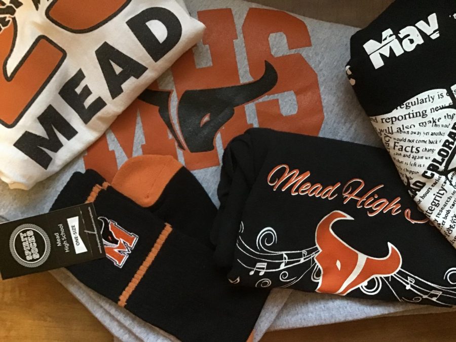 A student displays their collection of Mead spirit gear.