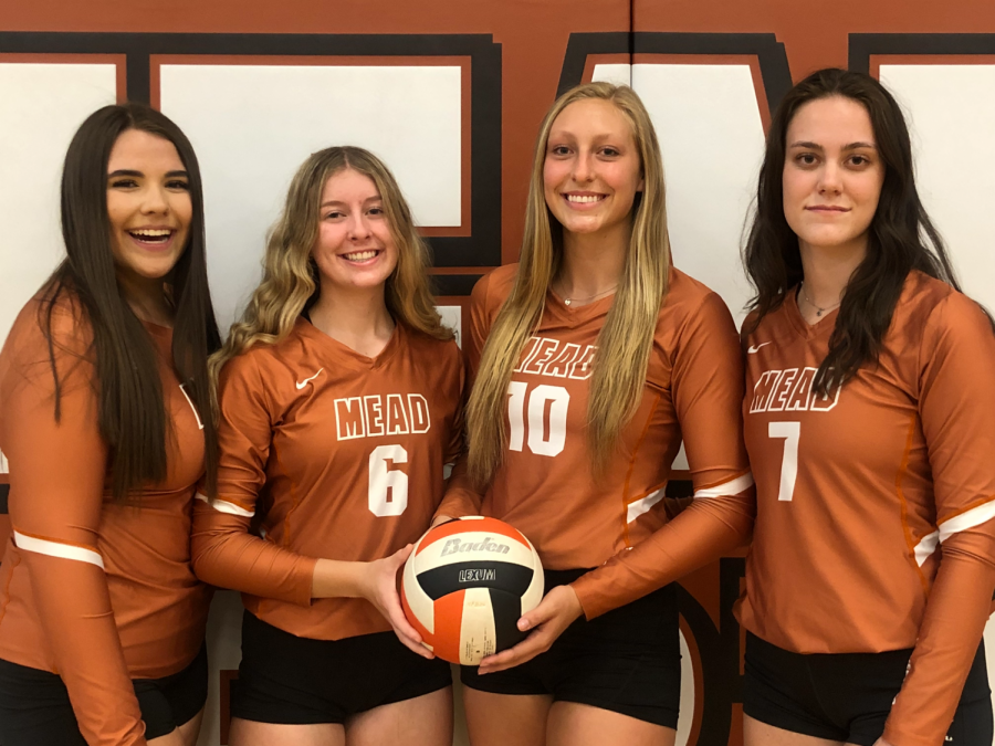 Volleyball seniors Katie Couch, Tayler Tatham, Quincey Coyle, and Morgan Munro. 