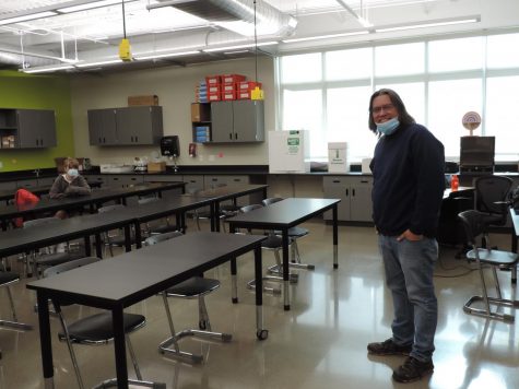 Mr. Jim Kuhn, current professor of the ASL 121 concurrent enrollment class offered at Mead, stands at the front of an Energy Academy classroom during class.