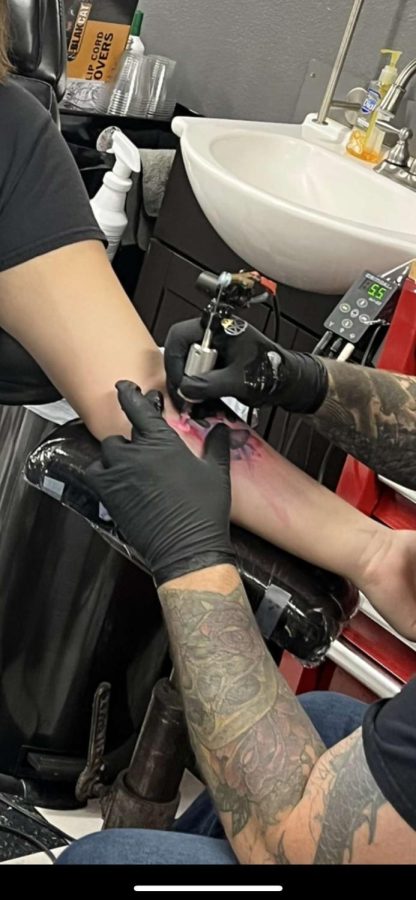 Kaliegh Beamish gets her forearm tattoo at Skinhouse in Longmont.