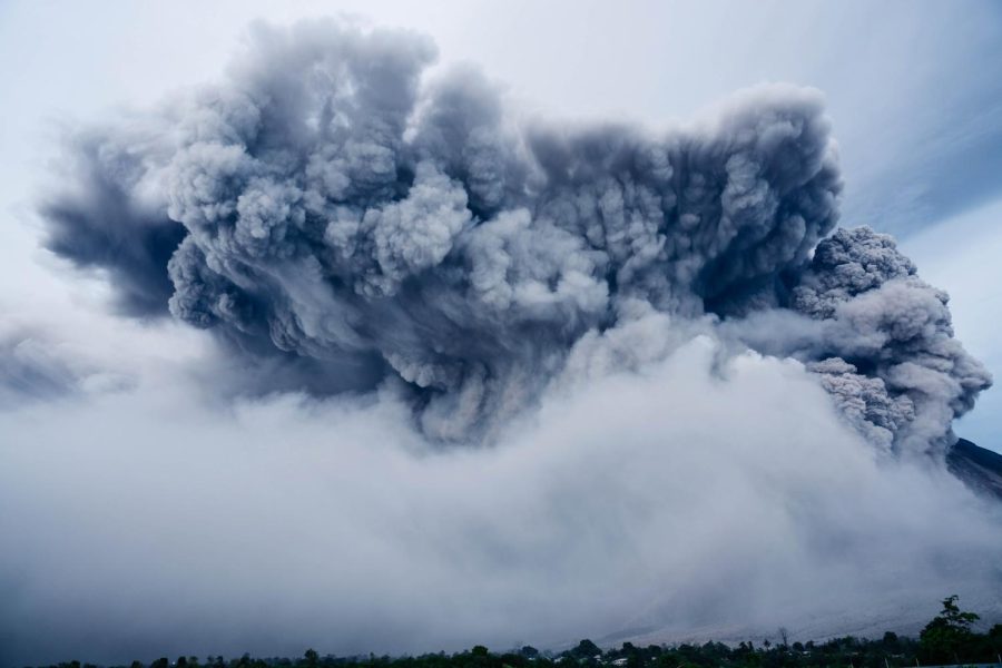 Hunga Tonga volcano spews ash and gas high into the air. 