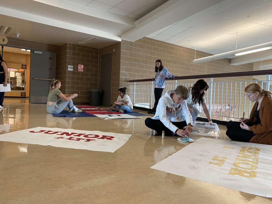 Student Council works on homecoming week posters.