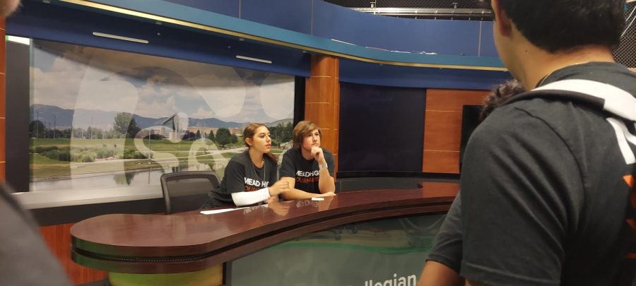 Jon Steidl (23) (MavTV Editor) and Stacy Avitia (23) (The Mav Managing Editor) sit in the CSU Broadcast studio.