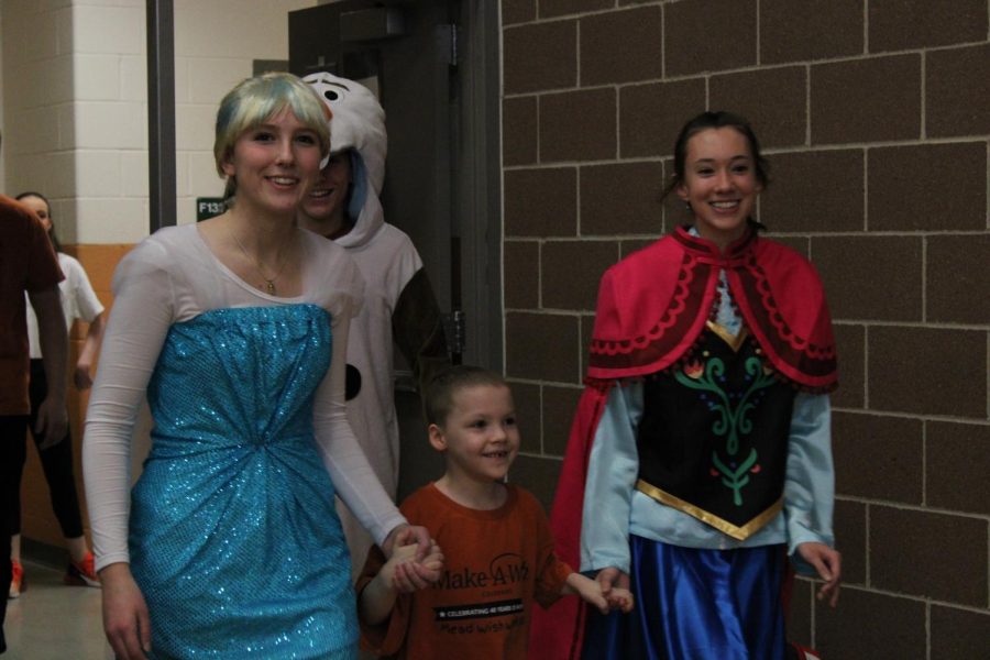 StuCo representatives dressed as characters from Frozen, Milas favorite movie.