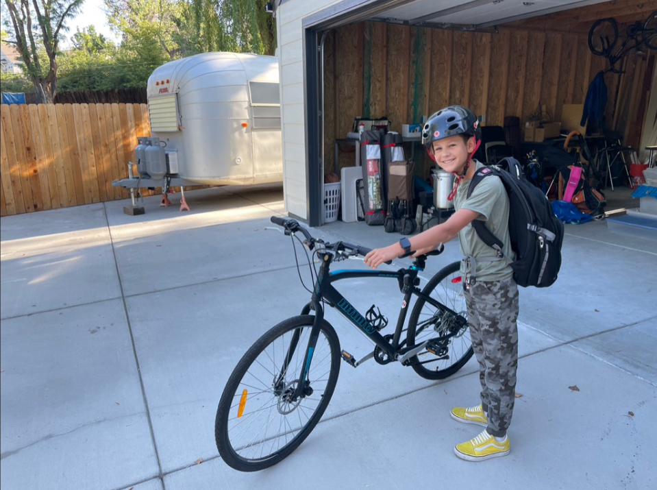 Liam+pictured+next+to+the+bike+he%E2%80%99d+bought+with+his+allowance%0A