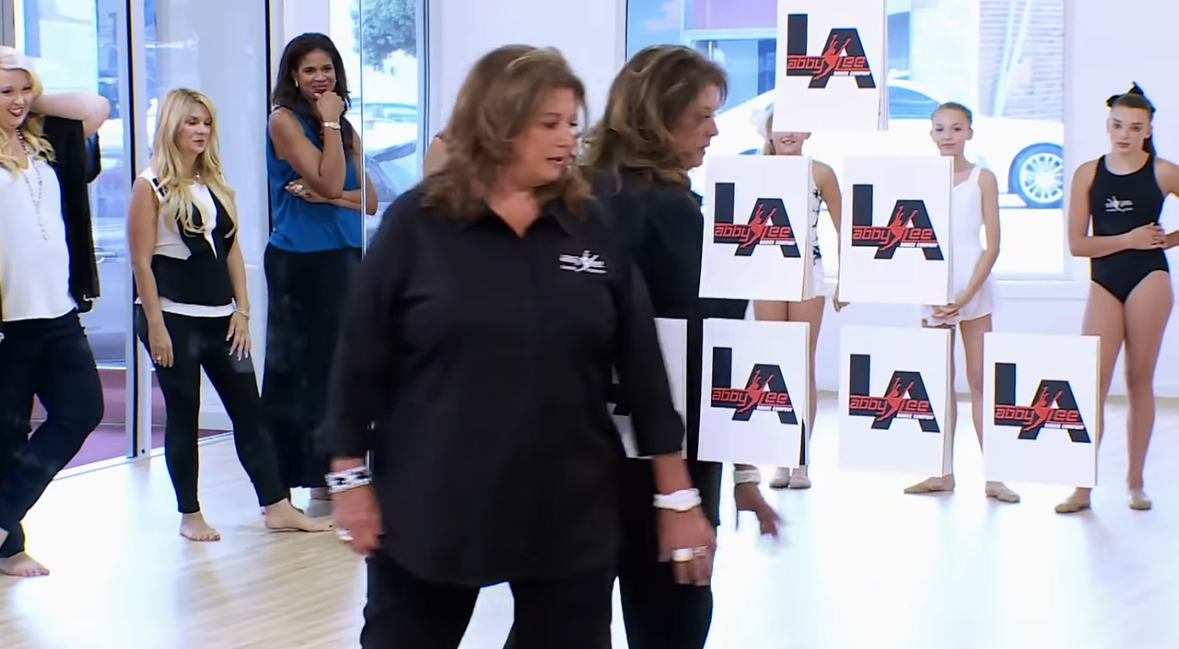 Abby Lee Miller reveals the weekly pyramid to the dancers. 