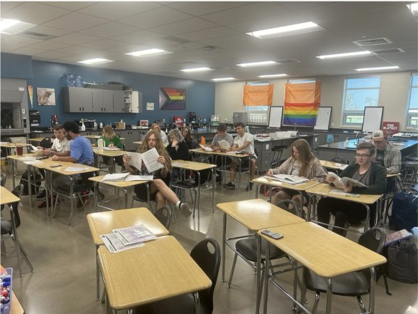 2024-2025 chemistry class looking over their notes at the beginning of class.