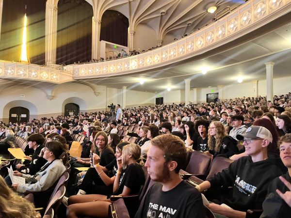 Members of the Journalism class prepare for the opening session of the day. 