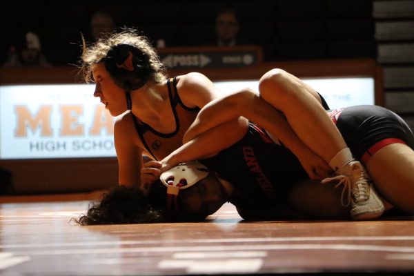 Morgan McDonald ('26) represents Mead Girls Wrestling, scoring a takedown.