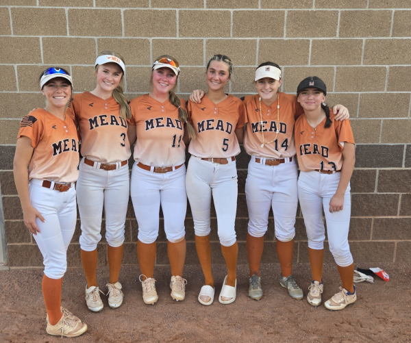 The senior class poses for a photo together after the game.