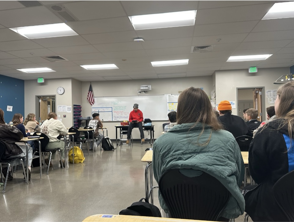 MCF leader Derek Martinez (‘27) shares his own testimony during this past meeting.