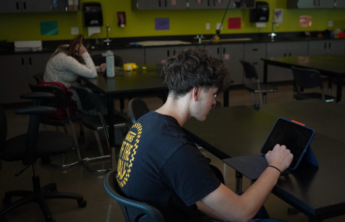 Students sit in H102 for tardy detention.