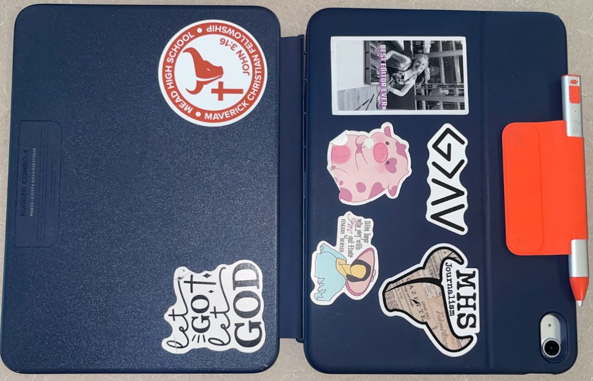 Brissa Mendez-Olivas (‘26) decorates her iPad with Maverick Christian Fellowship, Journalism, and other stickers for her interests.
