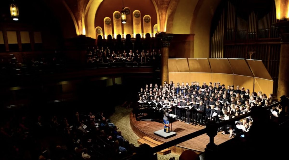 A choir working together as their brainwaves connect while performing. Photo courtesy of Omar Flores on Unsplash.