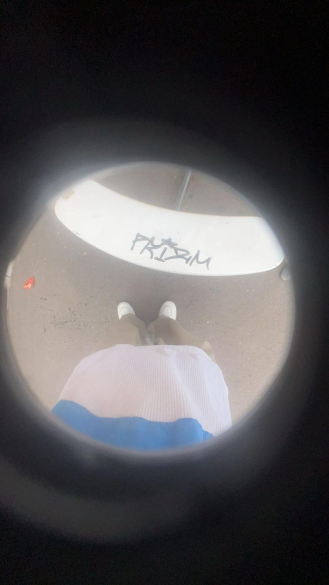 this small tag on a bench behind a grocery store. Or even..