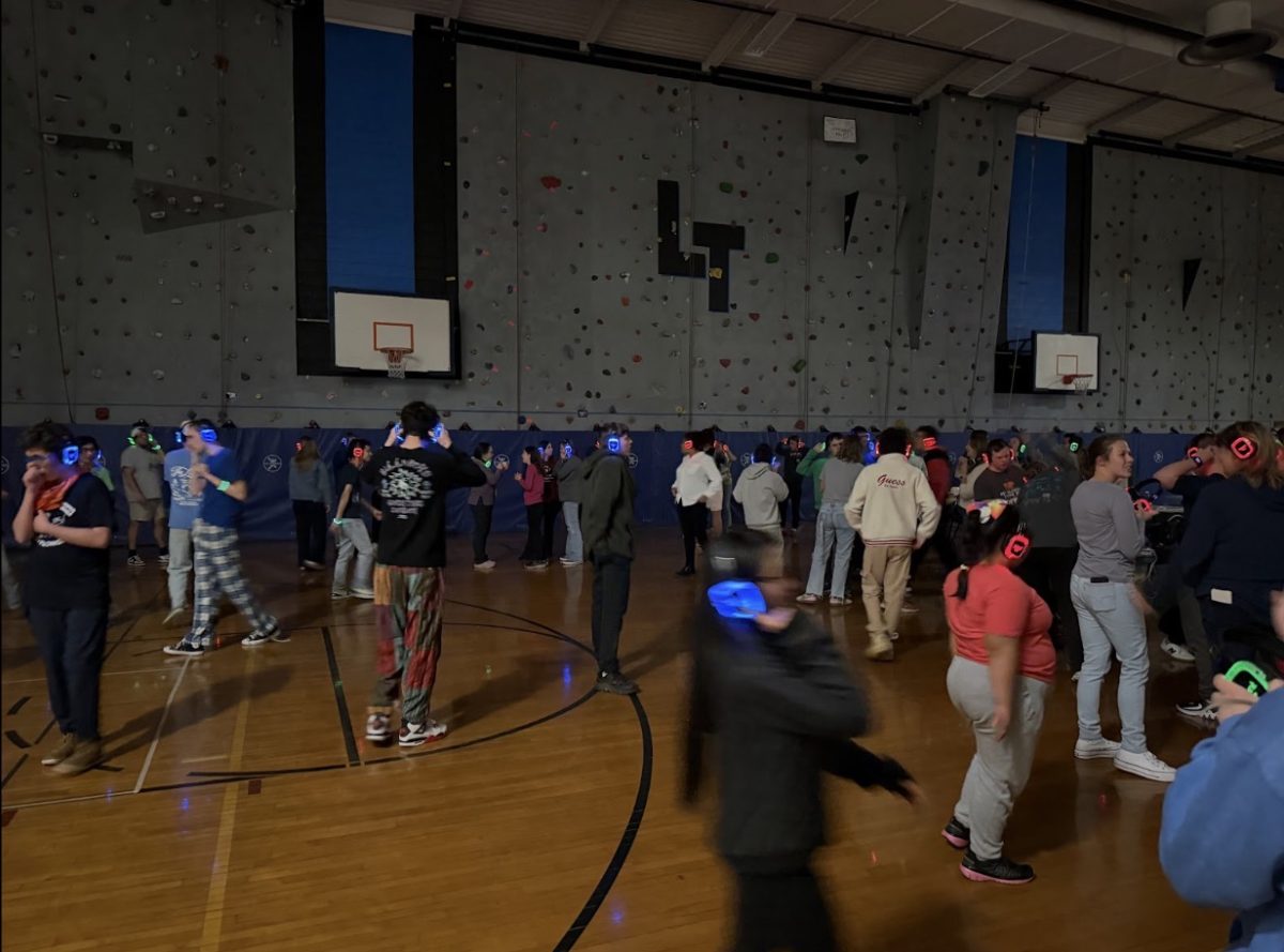 Participating students dance with one another to their own volume and channel, in their own space.